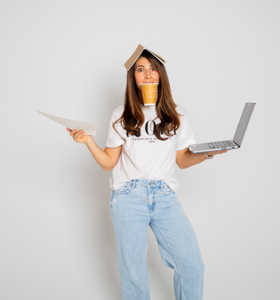 Operational overwhelm shown as a founder juggling paperwork, a laptop, and coffee while appearing stressed by competing business demands.