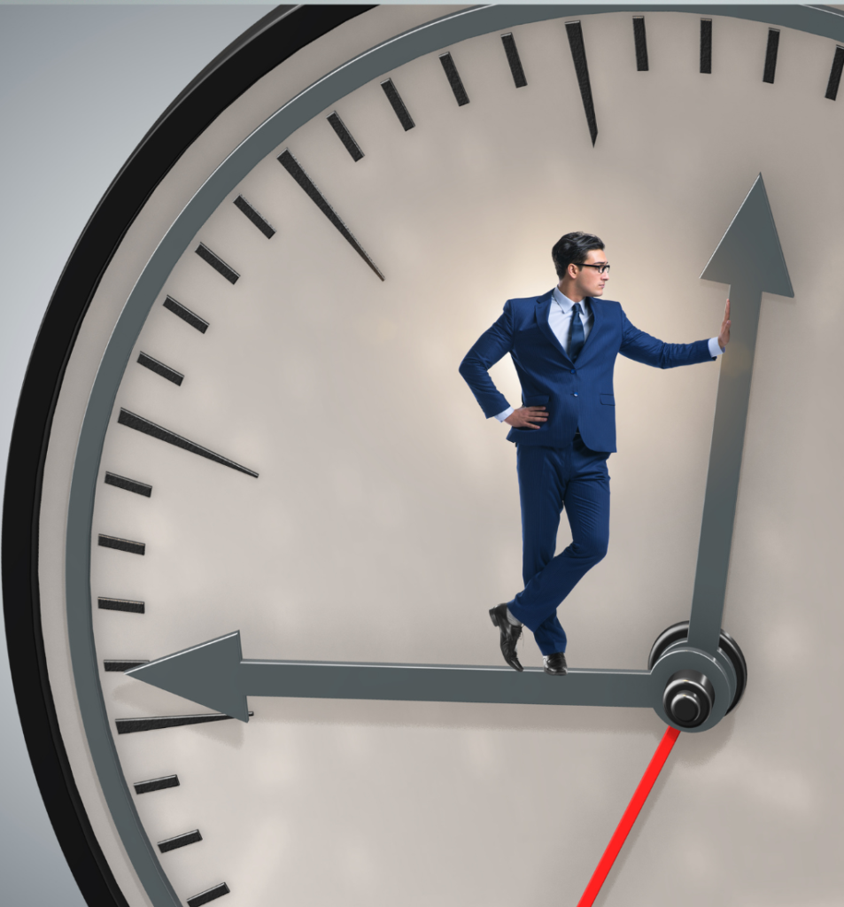Strategic planning time illustrated by a businessman standing on the hands of a giant clock, symbolizing time management and leadership priorities.